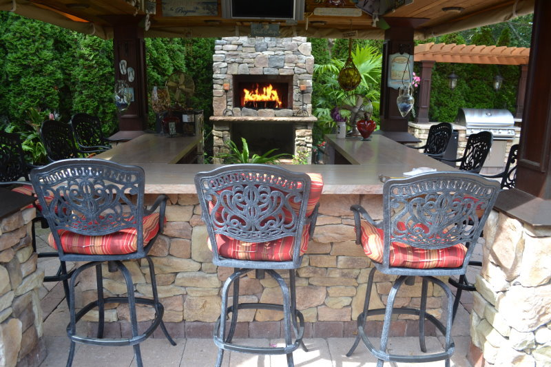 backyard bar island with fireplace